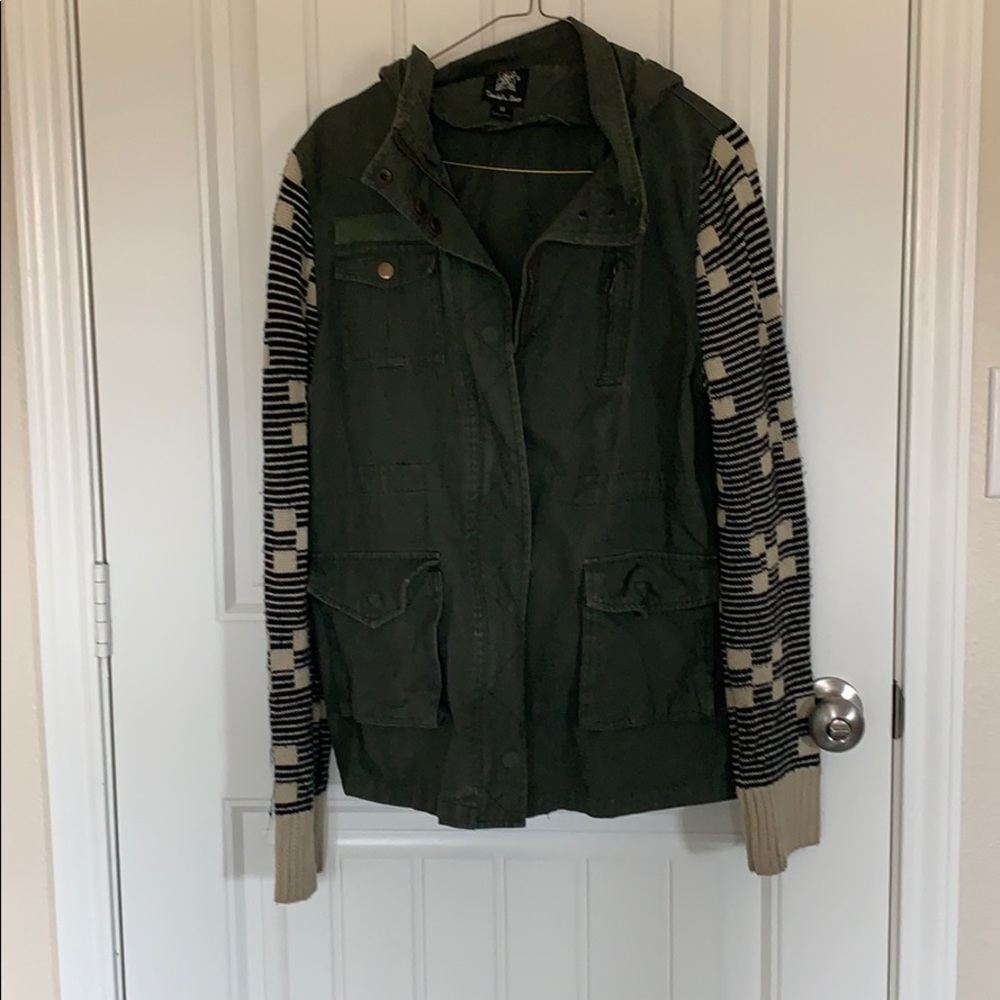 green utility jacket with sweater sleeves